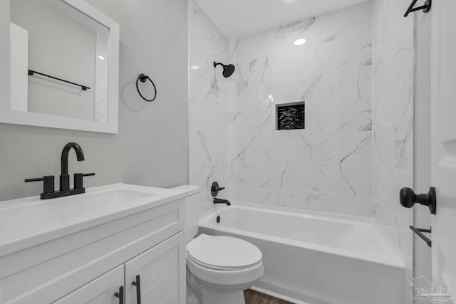 5686 Avondale Rd, Pensacola, FL 32526 - full bath featuring toilet, vanity,  shower combination, and wood finished floors