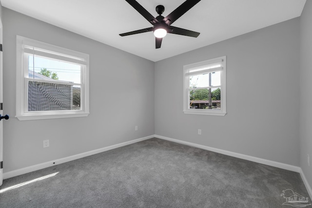 5686 Avondale Rd, Pensacola, FL 32526 - carpeted spare room featuring baseboards and a ceiling fan