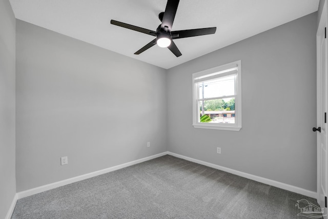 5686 Avondale Rd, Pensacola, FL 32526 - carpeted spare room featuring baseboards and a ceiling fan