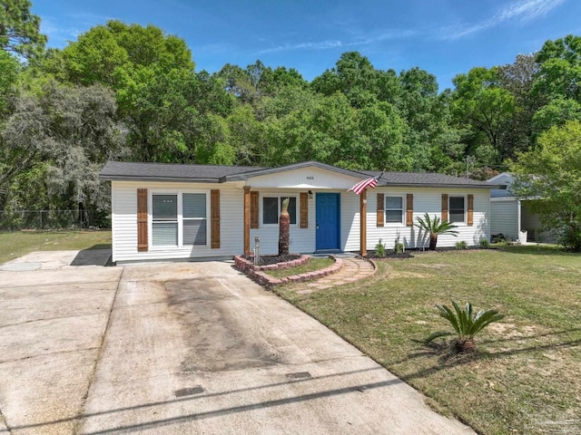 5686 Avondale Rd, Pensacola, FL 32526 - ranch-style home featuring a front yard and fence