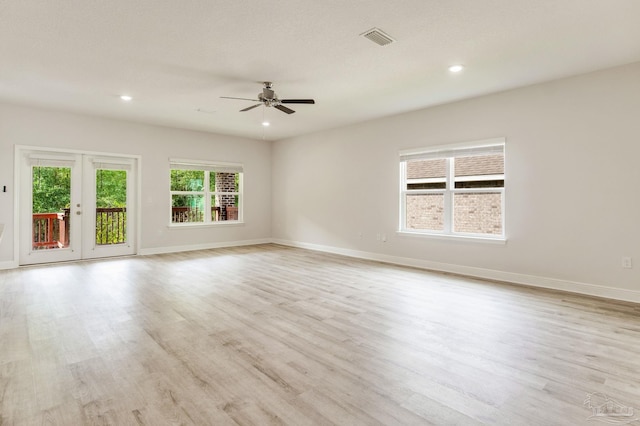 7822 Burnside Loop, Pensacola, FL 32526 - empty room featuring a ceiling fan, light wood-type flooring, recessed lighting, and french doors