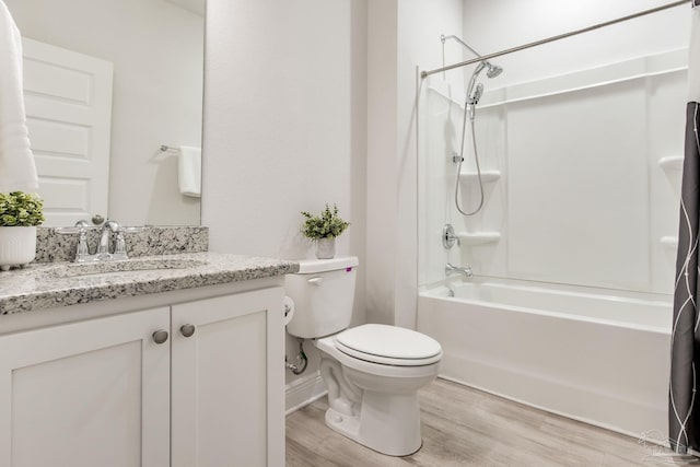 7822 Burnside Loop, Pensacola, FL 32526 - bathroom featuring vanity, shower / bath combination, and wood finished floors