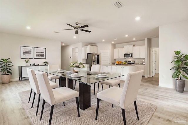 7822 Burnside Loop, Pensacola, FL 32526 - dining room with light wood-style floors, ceiling fan, and recessed lighting