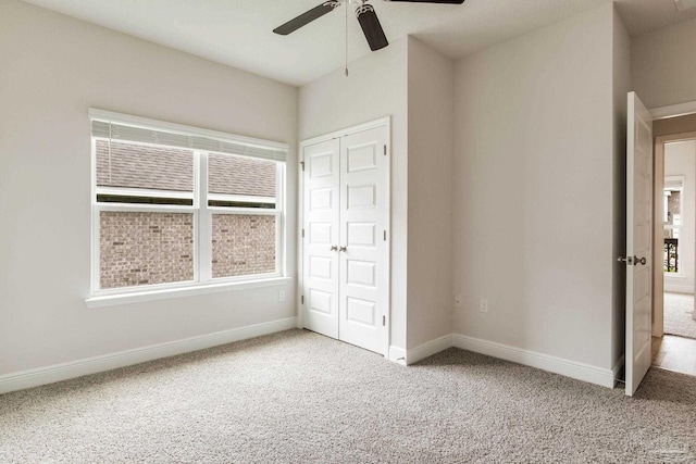 7822 Burnside Loop, Pensacola, FL 32526 - unfurnished bedroom with carpet flooring, a closet, and a ceiling fan