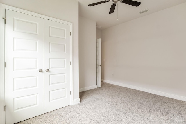7822 Burnside Loop, Pensacola, FL 32526 - unfurnished bedroom with carpet floors, a closet, and a ceiling fan