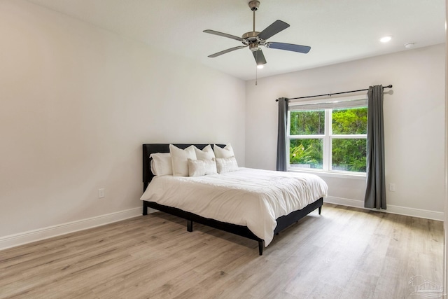 7822 Burnside Loop, Pensacola, FL 32526 - bedroom featuring light wood-style floors, ceiling fan, and recessed lighting