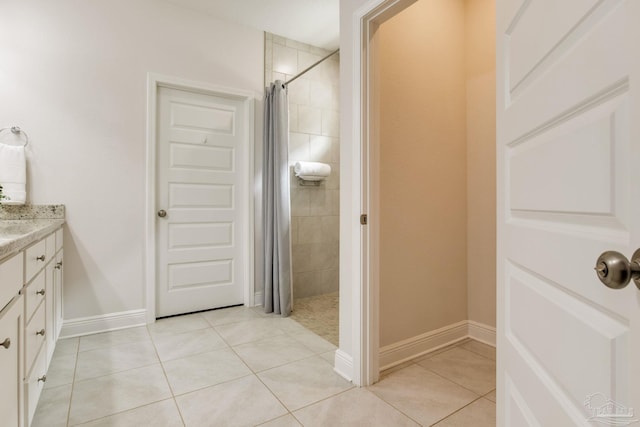 7822 Burnside Loop, Pensacola, FL 32526 - full bath with tiled shower, vanity, and tile patterned floors