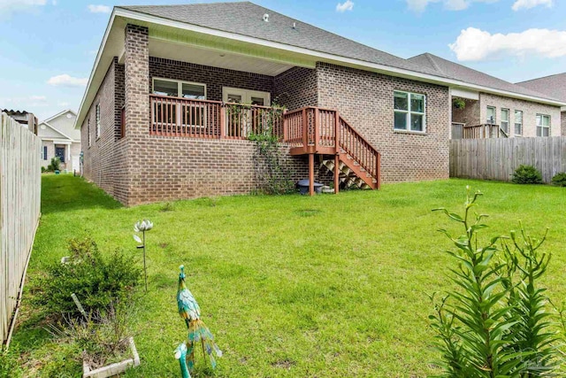 7822 Burnside Loop, Pensacola, FL 32526 - back of house with brick siding, stairs, and a deck