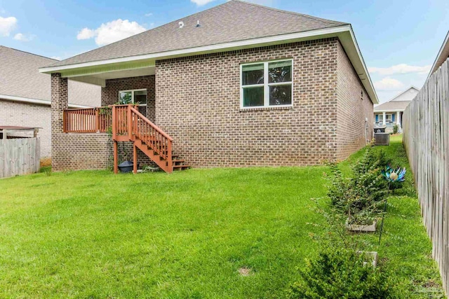 7822 Burnside Loop, Pensacola, FL 32526 - back of house featuring brick siding, a shingled roof, and stairway