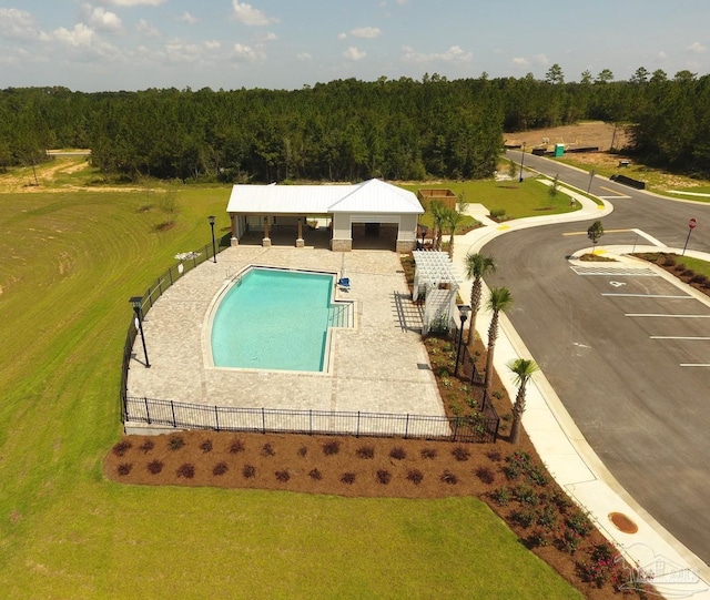 7822 Burnside Loop, Pensacola, FL 32526 - view of swimming pool featuring a wooded view