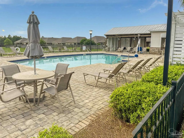 7822 Burnside Loop, Pensacola, FL 32526 - community pool with a patio