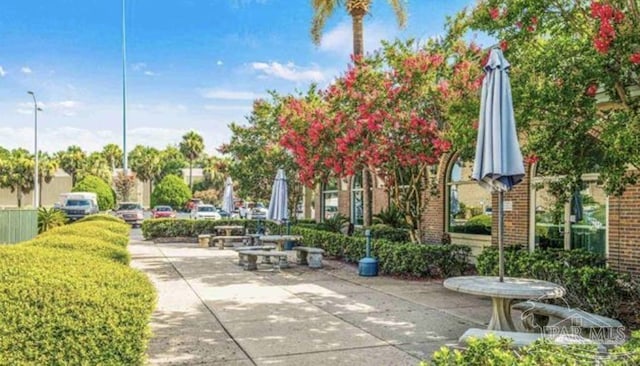 surrounding community featuring a patio area