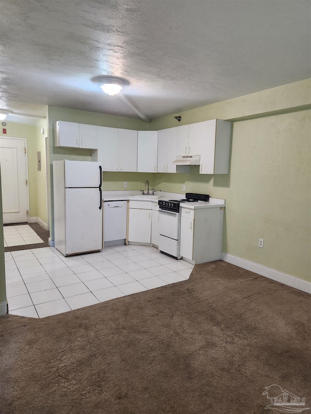 kitchen featuring white cabinets, light colored carpet, white appliances, and sink