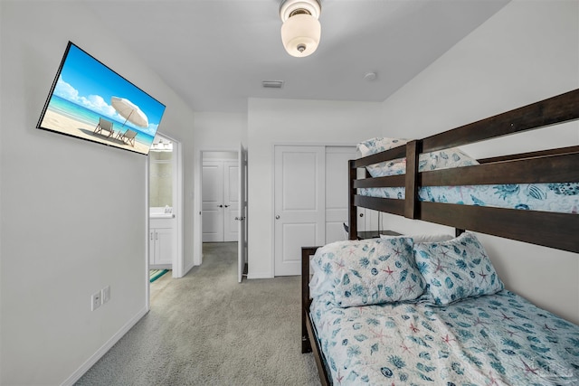 bedroom with light colored carpet