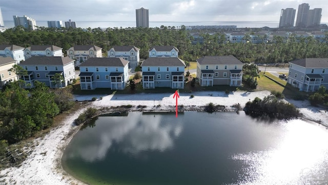 drone / aerial view featuring a water view