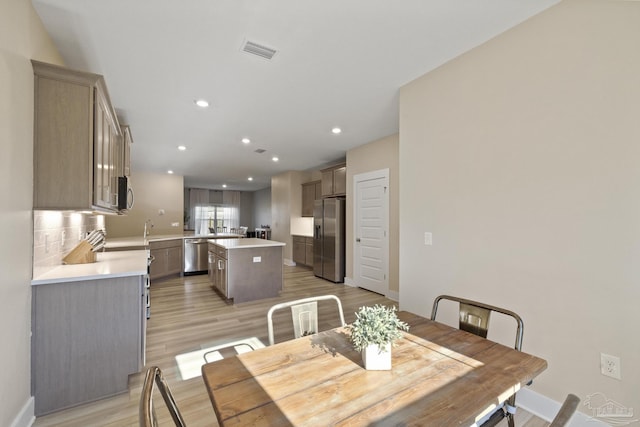 dining room featuring light hardwood / wood-style floors