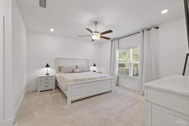 carpeted bedroom with ceiling fan