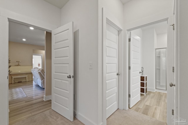 corridor featuring light wood-type flooring