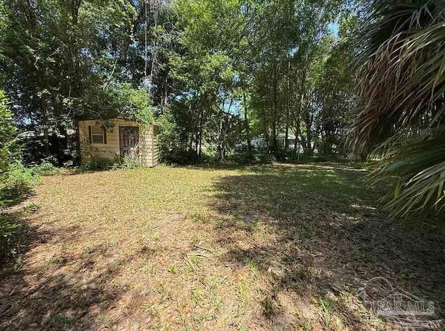 602 Coulter Ave, Cantonment, FL 32533 - view of green lawn