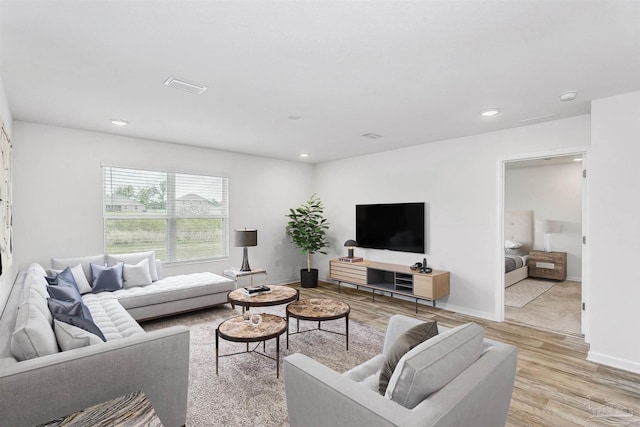 living room featuring light hardwood / wood-style floors