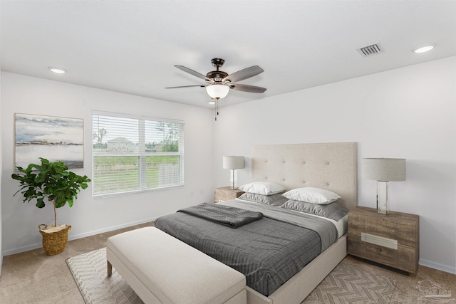 carpeted bedroom featuring ceiling fan