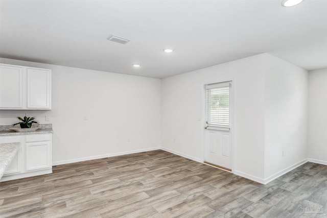 empty room featuring light hardwood / wood-style flooring