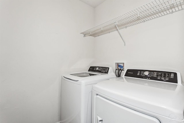 laundry area featuring washer and clothes dryer