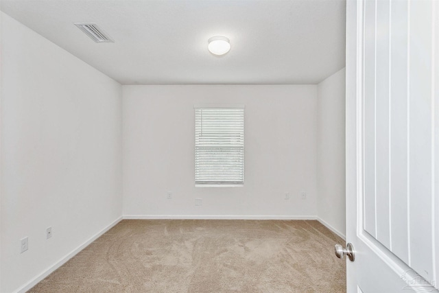 empty room with light carpet