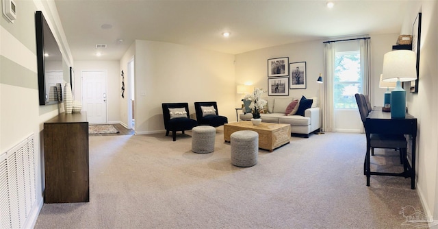 living room featuring recessed lighting, carpet flooring, baseboards, and visible vents