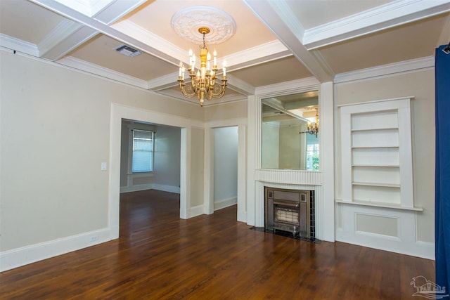 unfurnished living room featuring built in shelves, coffered ceiling, crown molding, a notable chandelier, and beamed ceiling