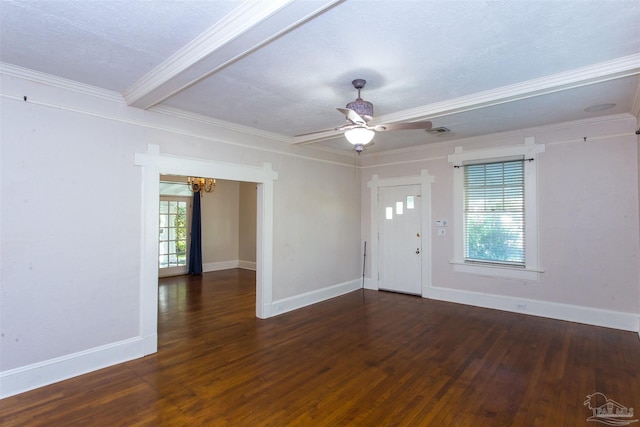 entryway featuring dark wood-type flooring, ornamental molding, ceiling fan with notable chandelier, and a textured ceiling