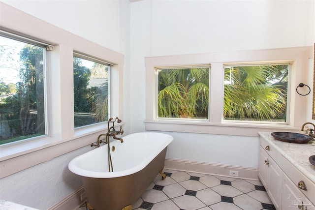 bathroom featuring a bathing tub and vanity