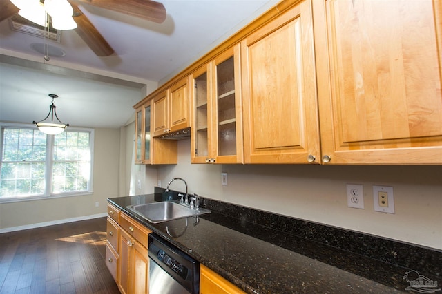 kitchen featuring sink, dishwasher, dark stone countertops, dark hardwood / wood-style flooring, and decorative light fixtures