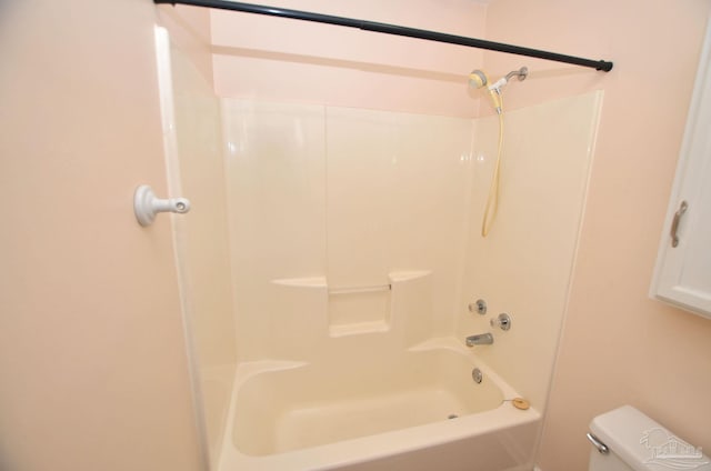 full bath featuring shower / bath combination and toilet