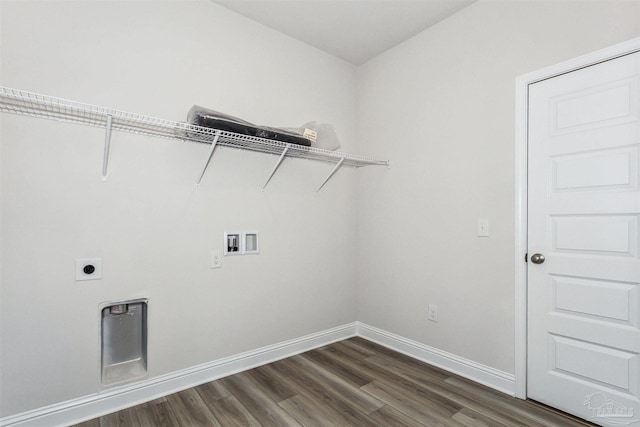 washroom featuring dark hardwood / wood-style flooring, hookup for a washing machine, and electric dryer hookup