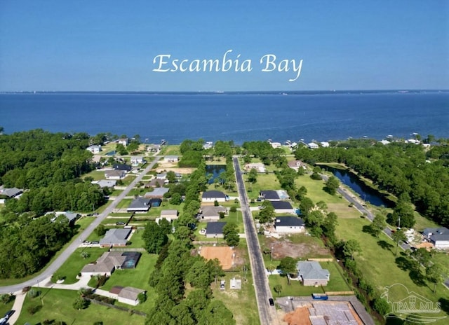 drone / aerial view featuring a water view and a residential view