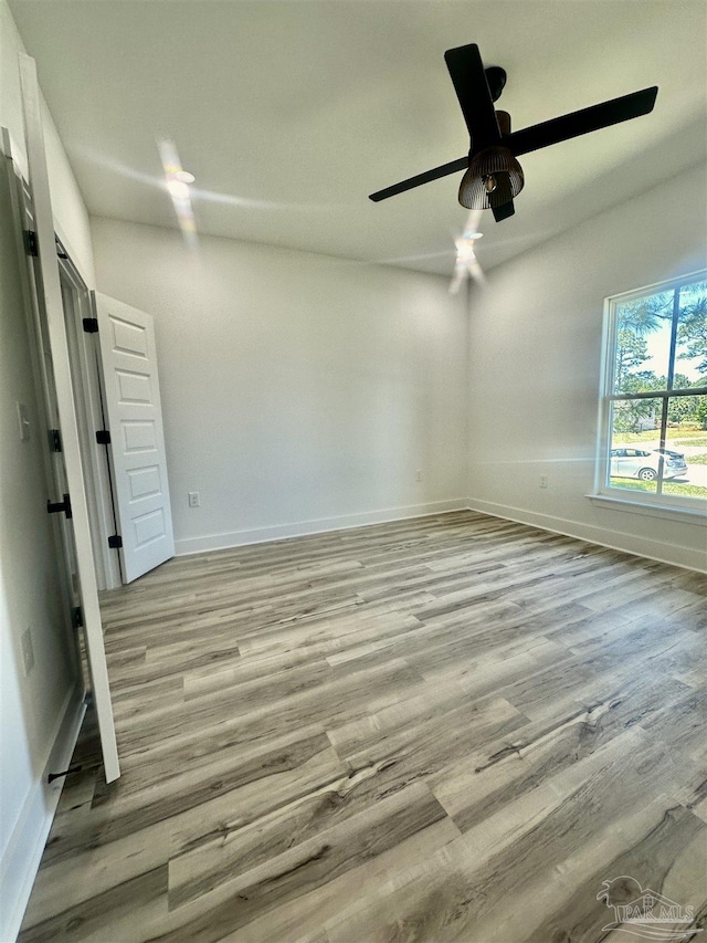 1181 Adrian Way, Milton, FL 32583 - spare room featuring light wood finished floors, baseboards, and ceiling fan