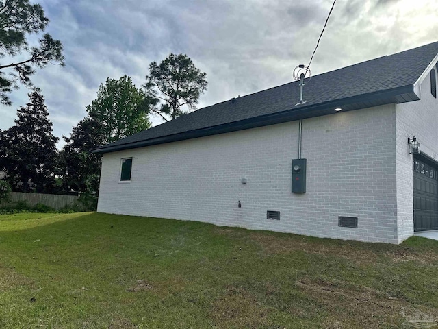 1181 Adrian Way, Milton, FL 32583 - view of property exterior with brick siding, a garage, crawl space, and a shingled roof