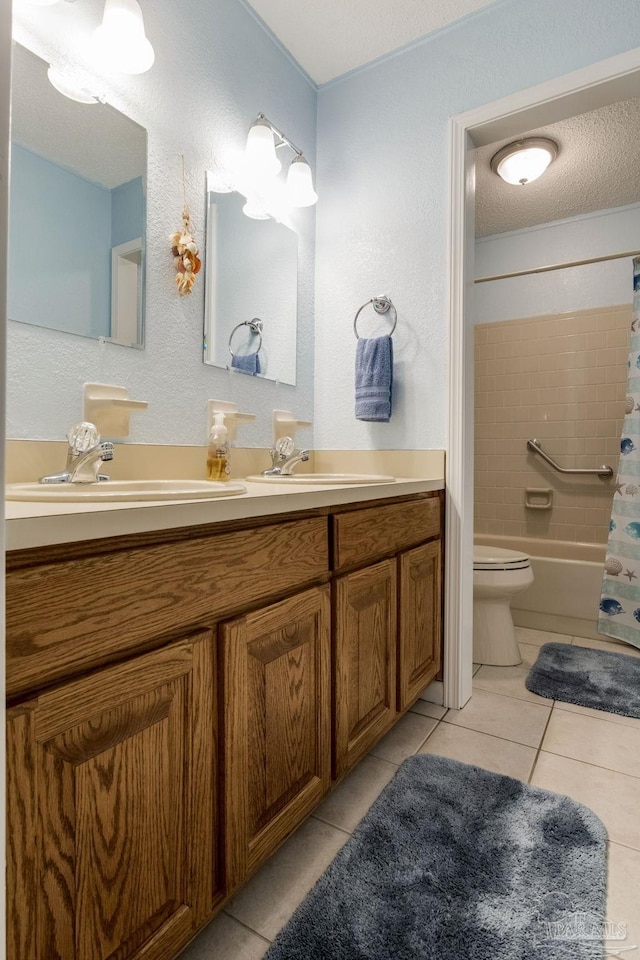 6028 Laurelwood Dr, Milton, FL 32570 - bathroom featuring double vanity, toilet, tile patterned floors, shower / tub combo, and a textured ceiling