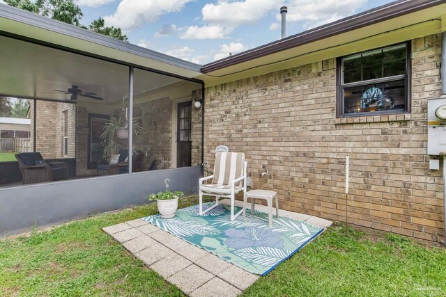 6028 Laurelwood Dr, Milton, FL 32570 - view of patio / terrace with a ceiling fan and a sunroom