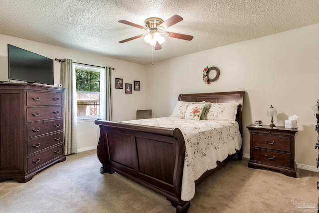 6028 Laurelwood Dr, Milton, FL 32570 - bedroom featuring light colored carpet, a textured ceiling, baseboards, and ceiling fan