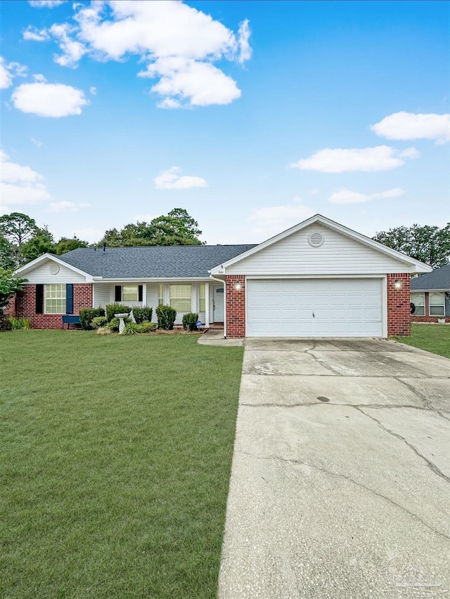 single story home featuring a front yard and a garage