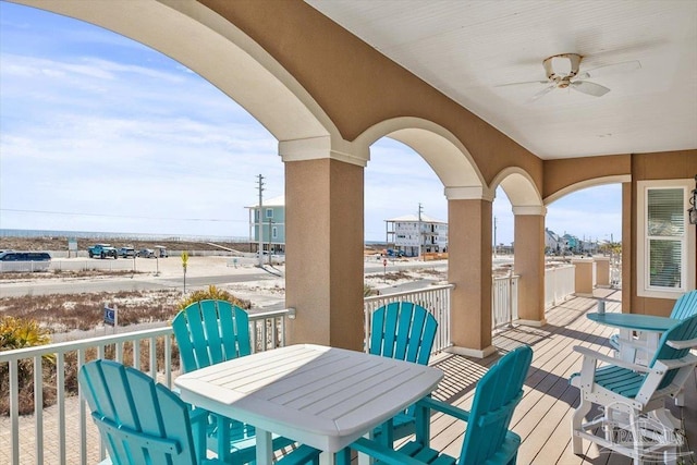 balcony with ceiling fan and outdoor dining space