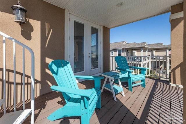 balcony featuring french doors