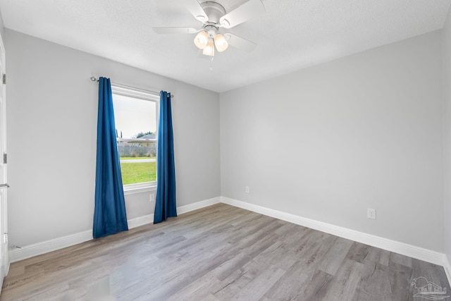 1548 Joseph Cir, Gulf Breeze, FL 32563 - spare room featuring ceiling fan, baseboards, and wood finished floors