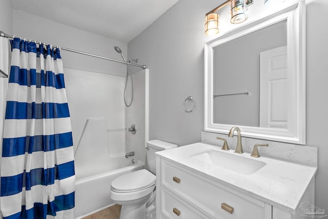 1548 Joseph Cir, Gulf Breeze, FL 32563 - full bathroom featuring toilet, shower / tub combo with curtain, wood finished floors, a textured ceiling, and vanity