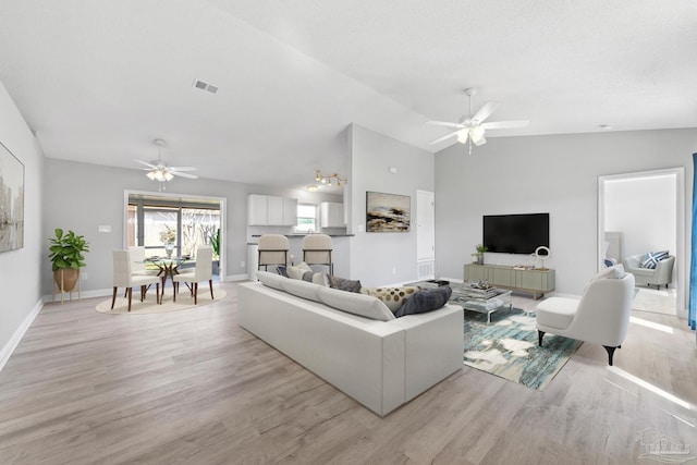 1548 Joseph Cir, Gulf Breeze, FL 32563 - living room with light wood-type flooring, a ceiling fan, and vaulted ceiling