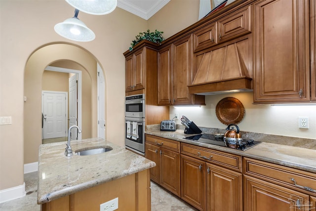 2792 Pga Blvd, Navarre, FL 32566 - kitchen with black electric cooktop, a sink, light stone counters, double oven, and ornamental molding