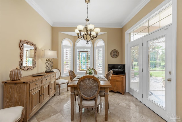 2792 Pga Blvd, Navarre, FL 32566 - dining space featuring a chandelier, ornamental molding, and baseboards