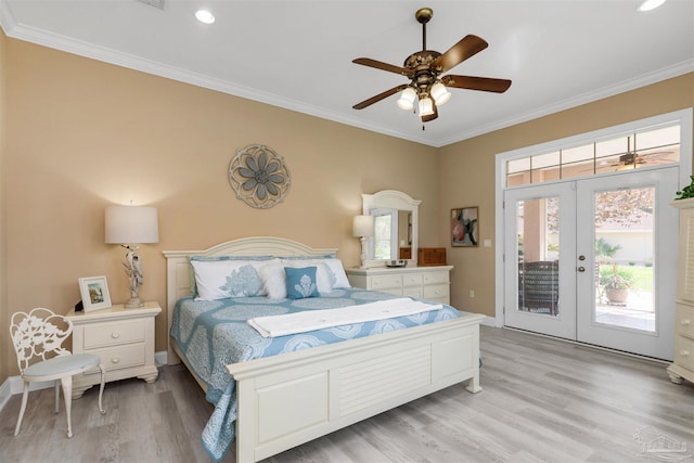 2792 Pga Blvd, Navarre, FL 32566 - bedroom featuring french doors, access to exterior, light wood-style flooring, ornamental molding, and baseboards